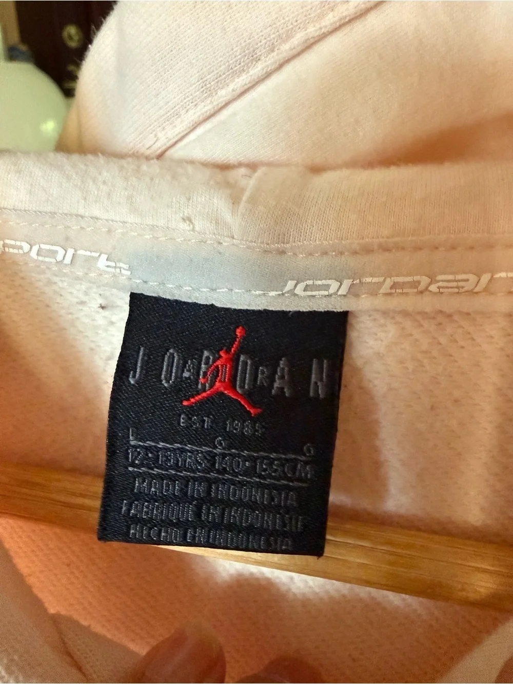 Light pink Jordan cropped pullover hoodie